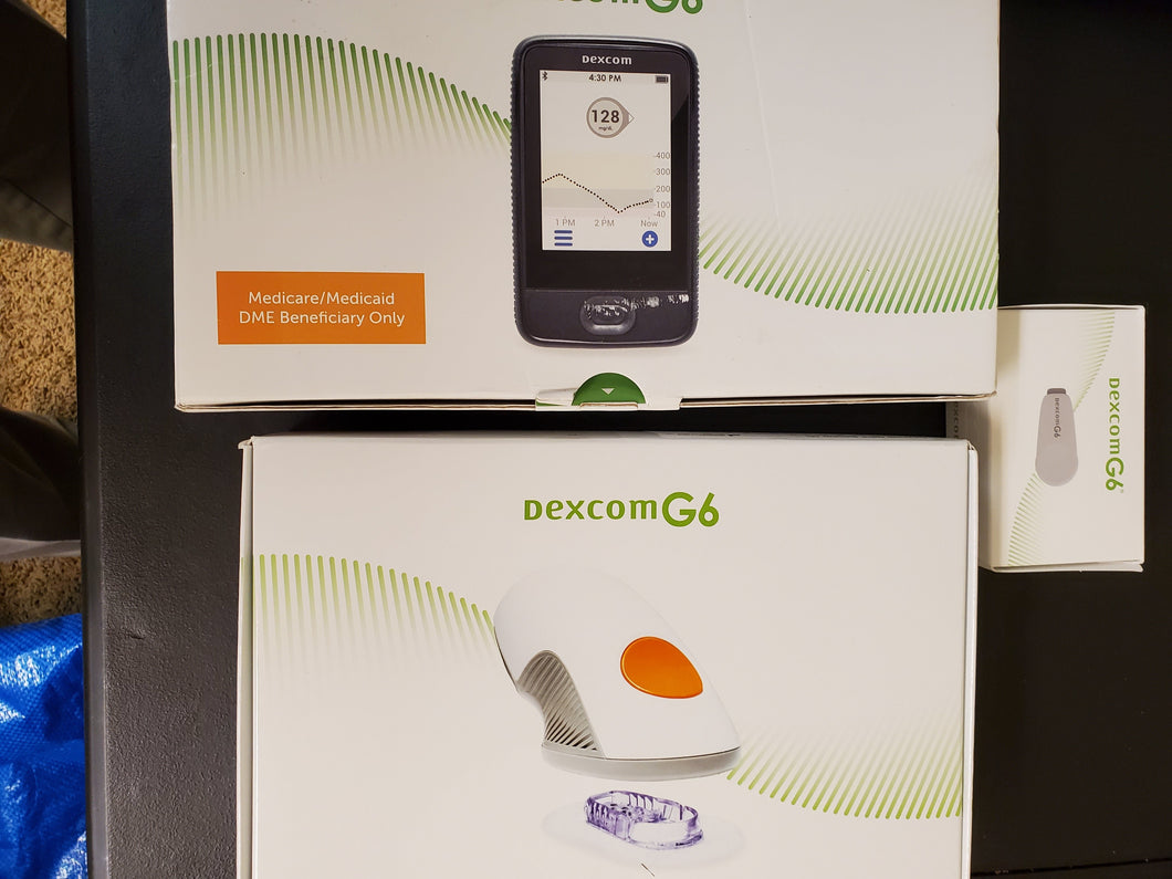 *Dexcom G6 system complete with receiver, transmitter, and sensors